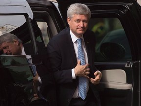 Outgoing Prime Minister Stephen Harper arrives at his Langevin office in Ottawa, Wednesday Oct. 21, 2015. THE CANADIAN PRESS/Adrian Wyld