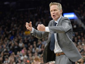 In this March 19, 2016 file photo, Golden State Warriors head coach Steve Kerr yells at a referee before being called for a technical foul during the first half of an NBA basketball game against the San Antonio Spurs, in San Antonio. (AP Photo/Darren Abate, File)