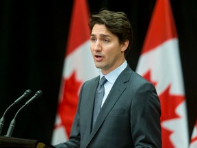 Prime Minister Justin Trudeau delivers a statement regarding the beheading death of Canadian John Ridsdel by Abu Sayyaf in the Phillipines on Monday, April 25, 2016 at the Delta Lodge at Kananaskis west of Calgary, Alta. Lyle Aspinall/Postmedia Network