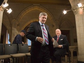 Prime Minister Stephen Harper walks away following a television interview with Mike Duffy in Ottawa Feb. 20, 2007. Harper's lawyer says the former prime minister played no role in the decision by the RCMP and Crown attorneys to charge and prosecute Sen. Duffy. (THE CANADIAN PRESS/Tom Hanson)