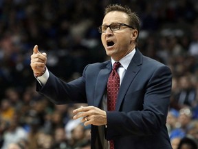 In this Dec. 28, 2014, file photo, former Oklahoma City Thunder coach Scott Brooks yells from the sideline during the first half of an NBA basketball game against the Dallas Mavericks in Dallas. (AP Photo/LM Otero, File)