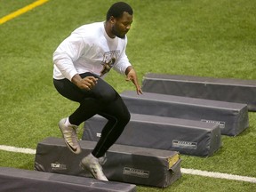 University of Manitoba Bisons defensive tackle David Onyemata runs a drill for NFL scouts in Winnipeg on March 14, 2016. (Brian Donogh/Postmedia Network)