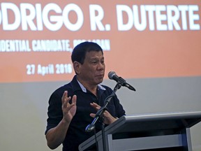 Philippine presidential candidate and Davao ciity mayor Rodrigo 'Digong' Duterte gestures during the 2016 presidential dialogue with members of Makati business club in a hotel in Makati city, metro Manila, April 27, 2016. REUTERS/Romeo Ranoco