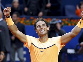 Rafael Nadal reacts after winning the Barcelona Open in Barcelona, Spain, April 24, 2016. (REUTERS/Albert Gea)