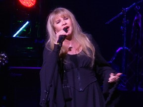 This image made from video shows singer Stevie Nicks singing "Rhiannon" during a surprise performance after the curtain call for the musical  "School of Rock," Tuesday, April 26, 2016, in New York. (AP Photo/Bruce Barton)