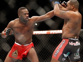 Light-heavyweight champion Jon Jones punches Daniel Comier during UFC 182 at the MGM Grand Garden Arena on January 3, 2015 in Las Vegas. (Steve Marcus/Getty Images/AFP)