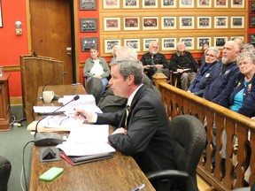 BRUCE BELL/THE INTELLIGENCER
Prince Edward County solicitor Wayne Fairbrother presents a Road Use Agreement for the White Pines Wind Farm Project to a packed Shire Hall on Tuesday night.