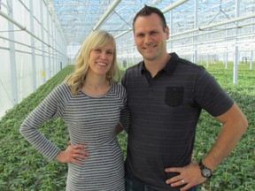 Jodi and Adrian Roelands stand in their Roelands Plant Farm greenhouse  on Wednesday April 27, 2016 near Forest, Ont. The couple opened their greenhouse operation in 2013, expanded in 2015 and expect to have a second expansion completed later this year. (Paul Morden, The Observer)