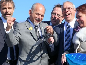 Tim Miller/The Intelligencer
Mayor Taso Christopher celebrates as the ribbon is cut at the official groundbreaking ceremony for Shorelines Casino Belleville building site on Wednesday.