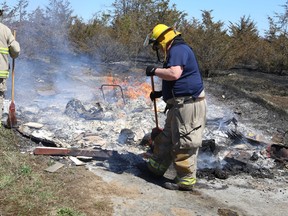 Loyalist firefighters battle a brush fire at a farm on the outskirts of Odessa on Wednesday, April 27, 2016.
Elliot Ferguson/The Whig-Standard/Postmedia Network