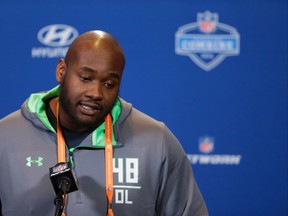 Mississippi offensive lineman Laremy Tunsil speaks during a press conference at the NFL football scouting combine in Indianapolis. (AP Photo/Michael Conroy, File)