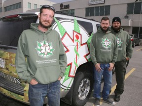 Marijuana For Trauma's Mike Collins, left to right, Andrew Brown and Rob Kennedy stand outside the company's new Kingston store. The store is to open next week and is to help veterans access medical cannabis. (Elliot Ferguson/The Whig-Standard)