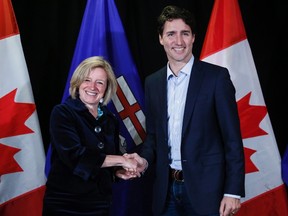 Prime Minister Justin Trudeau, right, meets with Alberta Premier Rachel Notley following meetings at a Liberal Party cabinet retreat in Kananaskis, Alta., Sunday, April 24, 2016. THE CANADIAN PRESS/Jeff McIntosh
