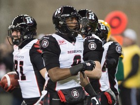 Ottawa Redblacks' Ernest Jackson celebrates Patrick Lavoie's touchdown during the 103rd Grey Cup against the Edmonton Eskimos in Winnipeg on Nov. 29, 2015. (THE CANADIAN PRESS/Ryan Remiorz)