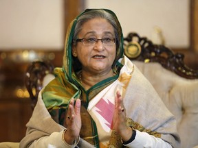 Bangladesh's Prime Minister Sheikh Hasina speaks during a media conference in Dhaka in this January 6, 2014 file photo. The execution of two Bangladeshi opposition leaders for war crimes appears to have cowed rivals of Prime Minister Sheikh Hasina, but critics said her success comes at the cost of free discourse and the calm is likely to be short-lived.  REUTERS/Andrew Biraj/Files