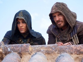Michael Fassbender (right) and Ariane Labed in "Assassin's Creed." (Supplied)