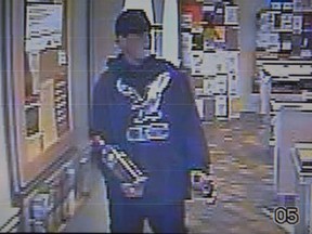 Video surveillance images of LCBO robbery suspect. (Kingston Police)