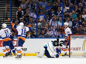 Tampa Bay Lightning goalie Ben Bishop falls to the ice as New York Islanders center Shane Prince scores a goal during the first period in game one of the second round of the 2016 Stanley Cup Playoffs at Amalie Arena. (Kim Klement-USA TODAY Sports)