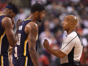 Pacers' Paul George (13) talks to the referee after taking a foul against the Raptors during second half NBA playoff action in Toronto on Tuesday, April 26, 2016. (Frank Gunn/THE CANADIAN PRESS)