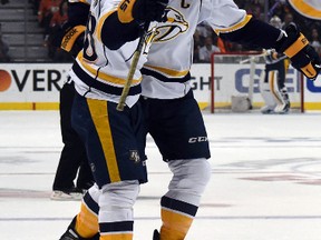Predators defenceman Shea Weber (6) and right wing Viktor Arvidsson (38) celebrate after a goal in the first period against the Ducks in Game 7 of the first round NHL playoff series in Anaheim on Wednesday, April 27, 2016. (Kirby Lee/USA TODAY Sports)
