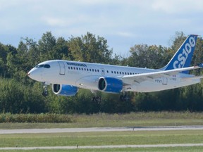 Bombardier's CSeries commercial jet takes off on its first flight on Monday, Sept. 16, 2013 in Montreal. Bombardier says Delta Air Lines Inc. has placed a firm order for 75 CS100 aircraft with options for an additional 50 CS100 aircraft in what would be the largest order for the CSeries jets. The company says, based on the list price, the firm order is valued at approximately US$5.6 billion. (THE CANADIAN PRESS/Ryan Remiorz)