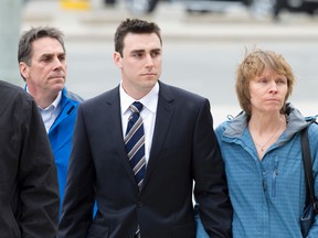 Jared Dejong, middle, arrives at the court house with supporters for his sentencing after pleading guilty in March in the drunk driving death of Western University student Andrea Christidis, in London, Ont. on Thursday April 28, 2016. (CRAIG GLOVER, The London Free Press)