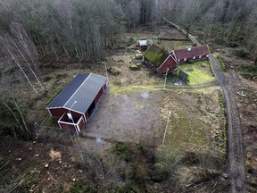 A specially constructed sound-proof bunker (L) is seen in the farm of Swedish doctor Martin Peter Trenneborg in this undated picture received by Reuters on February 23, 2016. The Swedish doctor was sentenced to 10 years in jail for kidnapping a woman and keeping her in a specially constructed sound-proof bunker. (REUTERS/Johan Nilsson/TT News Agency)