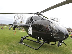 A 16-year-old boy faces charges after someone pointed a laser at the police helicopter on Wednesday night. (FILE PHOTO)