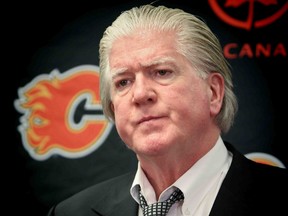 Calgary Flames president of hockey operations Brian Burke answers questions from the media in Calgary Wednesday March 5, 2014. (Al Charest/Calgary Sun/Postmedia Network)