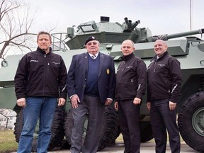 The Sarnia Saints rugby club's annual Playing it Forward fundraiser is supporting the installation of an Afghanistan war memorial monument in Veterans Park. From left are Playing it Forward organizer Tim Molyneaux, 1st Hussars Association president Ron Prior, Saints president Chris Groombridge and Playing it Forward organizer Jon Palumbo. (Handout/Sarnia Observer/Postmedia Network)