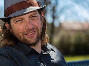 Rueben DeGroot, posing in Skeleton Park on Wednesday, and his band Rocket Surgery release their new live album at the Toucan pub on Saturday. (Nick Tardif/For The Whig-Standard)