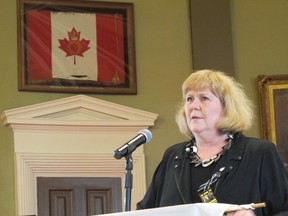 Nancy Hutchison, department leader for health and safety of the United Steelworkers, speaks at the National Day of Mourning ceremony at Kingston City Hall on April 28. (Kelsey Curtis/For The Whig-Standard)