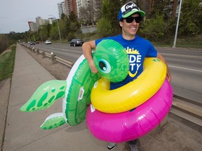 Event co-ordinator Scott Ward is pumped for Slide the City, the hugely popular waterslide attraction which returns to Edmonton July 23 at a new Victoria Park Road location.