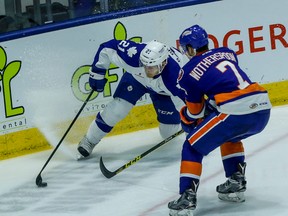 Marlies’ Ben Smith controls the puck as Bridgeport Sound Tigers’ Parker Wotherspoon gives chase during Game 3 on Thursday night at Ricoh Coliseum. Toronto won 6-4. (DAVE THOMAS/TORONTO SUN)