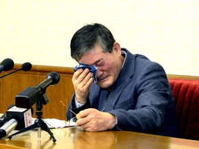 A man who identified himself as Kim Dong Chul, who previously said he was a naturalised American citizen and was arrested in North Korea in October, attends a news conference in Pyongyang, North Korea, in this undated photo released by North Korea's Korean Central News Agency (KCNA) in Pyongyang March 25, 2016. KCNA/via Reuters/File Photo
