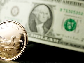 The Canadian dollar hit the 80-cent US mark minutes after North American stock markets opened for trading today. (Aaron Lynett/National Post/Postmedia Network Files)