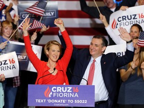 Republican presidential candidate Sen. Ted Cruz joined by former Hewlett-Packard CEO Carly Fiorina, waves during a rally in Indianapolis, Wednesday, April 27, 2016, when Cruz announced he has chosen Fiorina to serve as his running mate. (AP Photo/Michael Conroy)