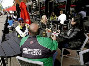 Customers at The Pint Public House in downtown Edmonton on April 29, 2016.