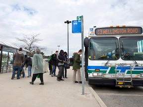 A London Transit bus picks up and drops off passengers at the bus terminal at Masonville Place in London. (Free Press file photo)