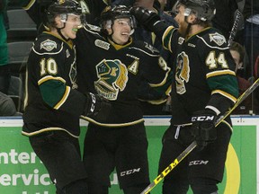 Mitch Marner, centre, celebrates a goal with Christian Dvorak, left, and Jacob Graves in Game 4 of the OHL Western Conference final against the Eire Otters at Budweiser Gardens on Wednesday. Marner is staying away from talk of all-time greatest London Knight, avoiding comparisons to Corey Perry. (DEREK RUTTAN, The London Free Press)