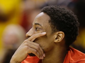 Raptors' DeMar DeRozan watches from the bench during the second half against the Pacers of Game 6 of the first round NBA playoff series in Indianapolis on Friday, April 29, 2016. (Darron Cummings/AP Photo)
