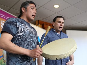 David Trudeau, left, and Brad Robinson, of the N'Swakamok Native Friendship Centre, perform at the launch of Reading Town Sudbury 2016 at Tom Davies Square in Sudbury, Ont. on Friday April 29, 2016. John Lappa/Sudbury Star/Postmedia Network