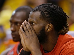 Raptors' DeMarre Carroll watches from the bench during the second half of Game 6 of the first round NBA playoff series against the Pacers in Indianapolis on Friday, April 29, 2016. (Darron Cummings/AP Photo)