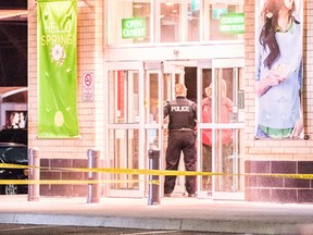 The scene after two people were shot and killed in a plaza at Victoria Park Ave. and Ellesmere Rd. on Friday night (Photo by Victor Biro)