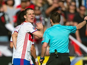Toronto FC forward Will Johnson (7) shares words with head referee Mathieu Broudeau during the first half against the D.C. United at Robert F. Kennedy Memorial. Toronto FC defeated D.C. United 1-0. (Tommy Gilligan-USA TODAY Sports)