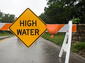 WIMBERLEY, TX - MAY 25: A 'High Water' is shown on Texas Ranch Road 12 on May 25, 2015 in Wimberly, Texas. (Photo by Drew Anthony Smith/Getty Images)