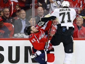 Washington, DC, USA; Pittsburgh Penguins center Evgeni Malkin (71) and Washington Capitals right wing Tom Wilson (43) get into an altercation in the second period in game one of the second round of the 2016 Stanley Cup Playoffs at Verizon Center. (Geoff Burke-USA TODAY Sports)