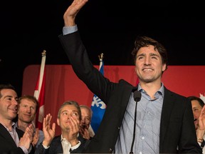 Prime Minister Justin Trudeau waves to supporters following his speech at the 2016 Biennial Convention of the Quebec wing of the Liberal Party of Canada in Montreal, Saturday, April 30, 2016. (THE CANADIAN PRESS/Graham Hughes)