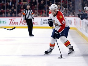 Florida Panthers forward Aleksander Barkov plays the puck during the first period against the Montreal Canadiens at the Bell Centre in Montreal on April 5, 2016. (Eric Bolte/USA TODAY Sports)
