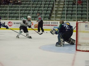 Portage Terriers' Shawn Bowles fires a shot during a win at the Western Canada Cup on Saturday. (Heather Jordan)